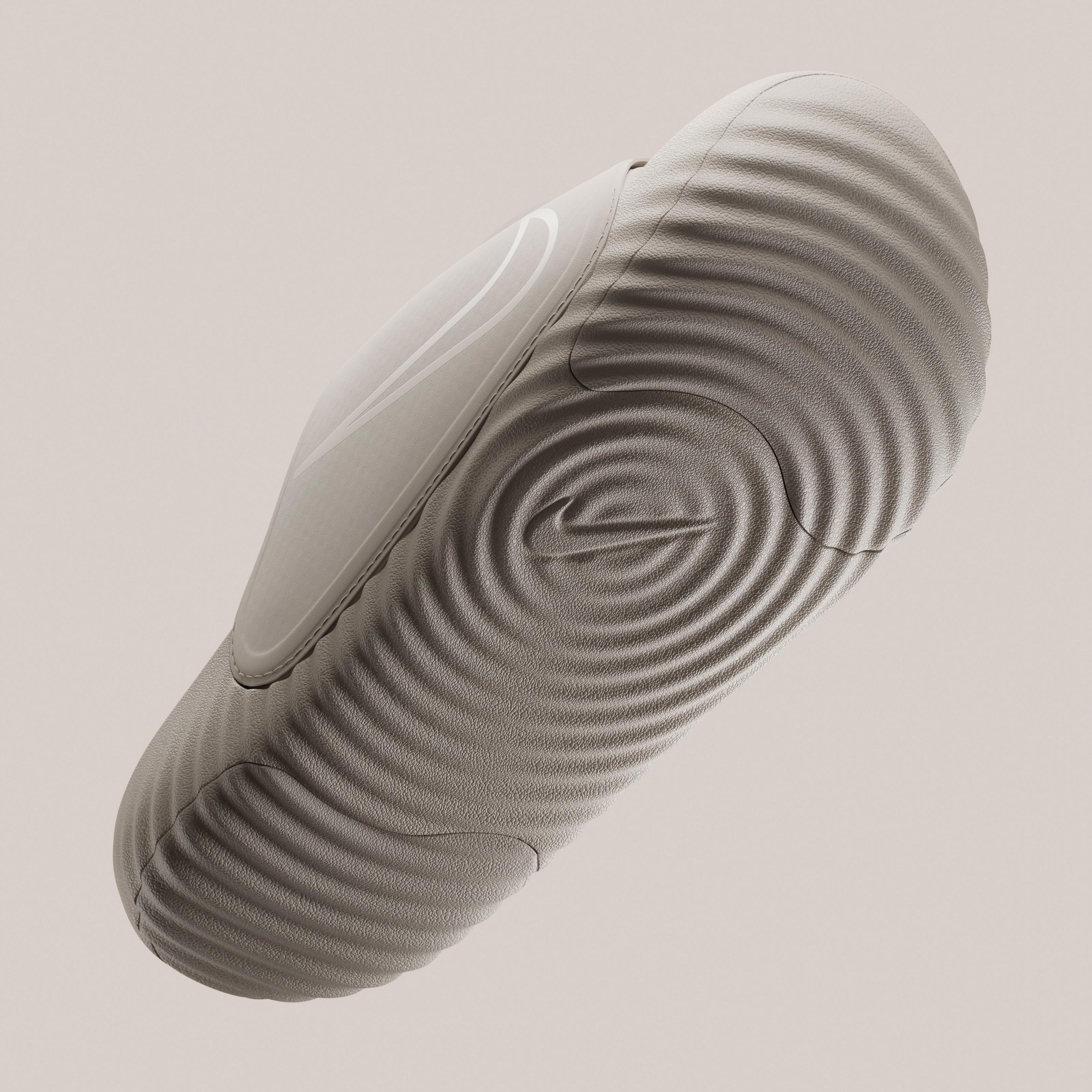 Bottom view of the Nike Air Zoom Hyperslide highlighting the textured outsole and full-length Air Zoom cushioning platform.